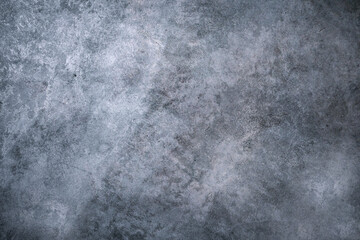 Obraz na płótnie Canvas Abstract empty backdrop for copy space. Cement textured gray wall background with grainy surface. There is blank place for your text. 