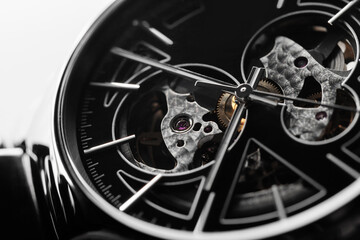 Swiss mechanical skeleton wrist watch with black metal deal