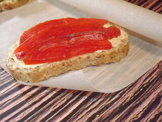 sandwiches with salmon, trout, sockeye salmon, cucumbers, egg and olives. High quality photo