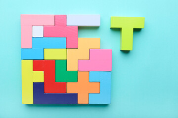 Multicolored puzzle,  cubes on a blue background