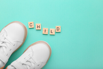 Baby shoes isolated on light background