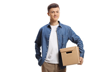 Guy standing with a cardboard box under arm