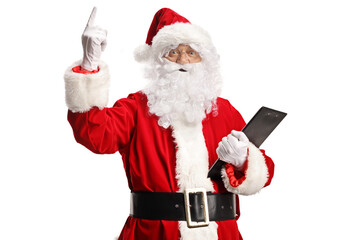 Santa Claus holding a clipboard and pointing up