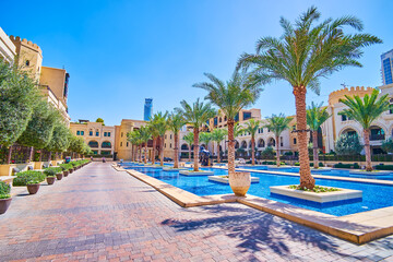 The wide alley in inner courtyard of Old Town Island in Dubai, UAE