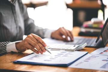 business woman work in the business office on the desk