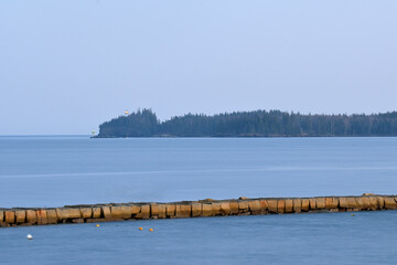 Rockland Harbor and the Breakwater with the Owls Head Lighthouse in the background