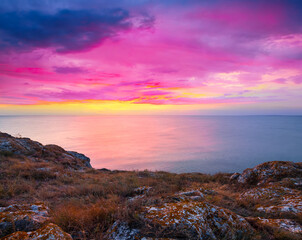 Obraz premium pink coloured sea bay at the twilight