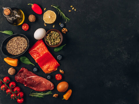 Low Fodmap diet concept. Low fodmap ingredients on black background.