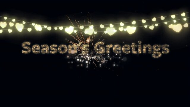 Animation of season's greetings over fairy light and fireworks exploding