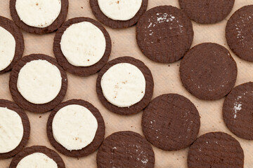 Obraz na płótnie Canvas chocolate cookies with creamy cream filling