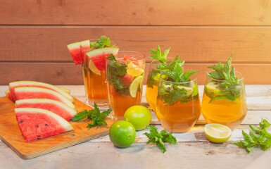 Glasses of watermelon mojito cocktail and mojito cocktail. Selective focus.