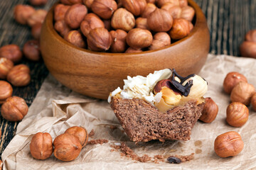 Obraz na płótnie Canvas chocolate cake with nougat and roasted hazelnuts