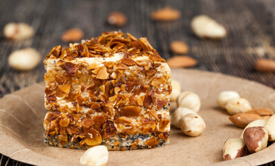 sweet cake with buttercream and sponge cake and lots of poppy seeds and nuts
