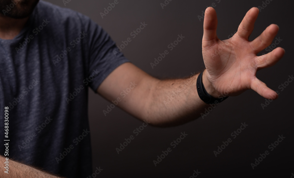 Poster man showing his empty hand.