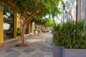 Street in Paphos Old Town with flower pots