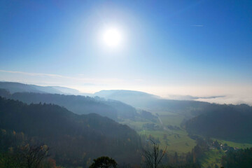 Aerial perspective of autumn landscape with sea of fog at region of Uetliberg Albis at Canton...