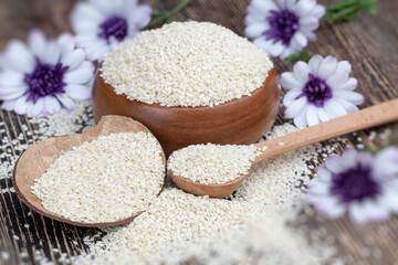 white sesame seeds on a wooden table