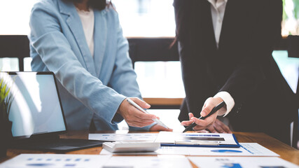 Team work with business analytic price chart on the table at the conference room.