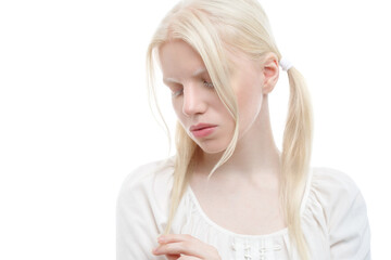 Gentle portrait of cute albino girl isolated on white background.