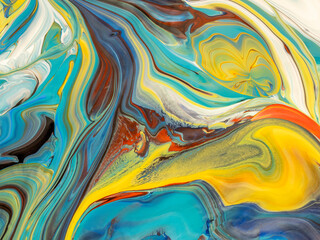 Abstract image of various colors of acrylic paint mixed together using a paint pouring  technique