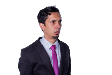 Businessman frozen with fear. Young adult surprised with his mouth open and somewhat frightened by what he saw. Isolated in a totally white background.