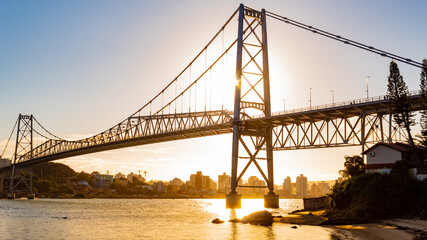 The sun and the structure of the Hercílio Luz bridge in Florianópolis, florianopolis, santa catarina, brazil