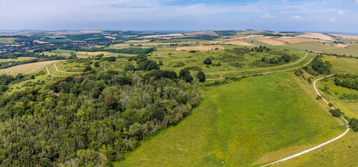 An aerial view over the hills on the South Downs above Worthing, Sussex in summertime - obrazy, fototapety, plakaty