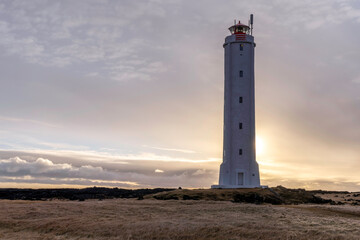 Fototapeta na wymiar Malarrif Lighthouse on the Snaefellsnes Peninsula in Iceland at sunset.