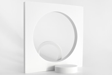 White podium on the white background, simple geometric forms. Podium for product, cosmetic...