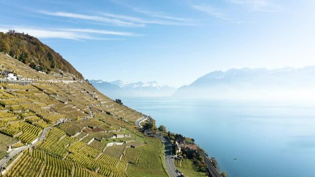 Les vignes de lavaux vues du ciel. Vue a&eacute;rienne en drone de bourg-en-lavaux et du lac l&eacute;man en 4k. 