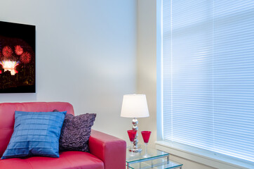 Interior design with lamp and two glasses on end table