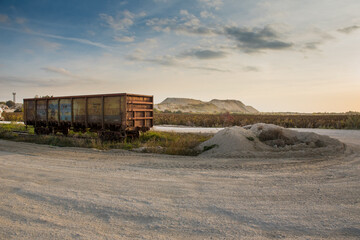 Rail freight car - loaded with crushed limestone extracted in the quarry