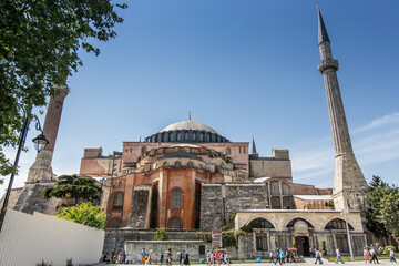 Fototapeta na wymiar The exterior of Hagia Sophia museum under the beautiful blue sky in Istanbul.