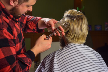 Male barber care. professional barber with male client. hipster with dyed beard and moustache. man want new hairstyle. male beauty and fashion. mature man at barbershop. man at hairdresser