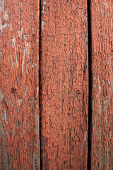 Texture of old wooden planks. Remains of old paint on the painted wood surface.