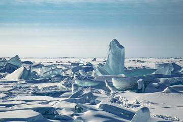 natural background,winter landscape,large blocks of ice with clear blue snow