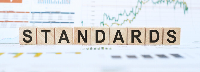Standards Word Written on Wooden Cubes. on a white background