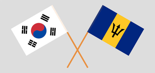 Crossed flags of South Korea and Barbados. Official colors. Correct proportion