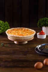 Delicious fresh quiche with broccoli, salmon and cheese