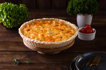 Delicious fresh quiche with broccoli, salmon and cheese
