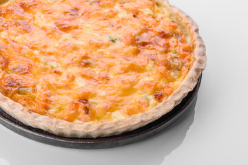 Delicious fresh quiche with broccoli, salmon and cheese
