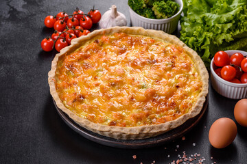 Delicious fresh quiche with broccoli, salmon and cheese