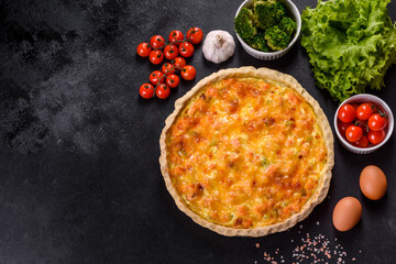 Delicious fresh quiche with broccoli, salmon and cheese