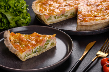 Delicious fresh quiche with broccoli, salmon and cheese