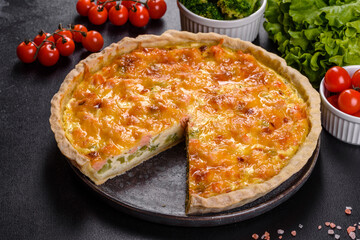 Delicious fresh quiche with broccoli, salmon and cheese