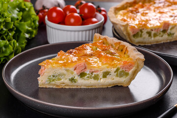 Delicious fresh quiche with broccoli, salmon and cheese