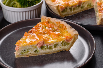 Delicious fresh quiche with broccoli, salmon and cheese