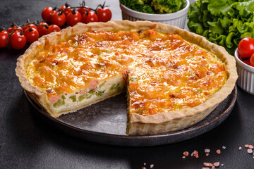 Delicious fresh quiche with broccoli, salmon and cheese