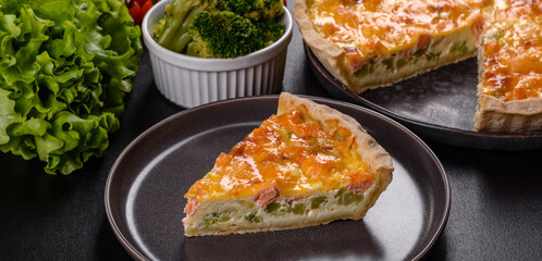 Delicious fresh quiche with broccoli, salmon and cheese