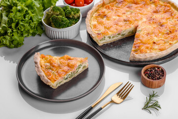 Delicious fresh quiche with broccoli, salmon and cheese